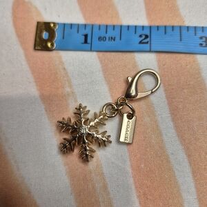 Coach Gold Snowflake Keychain
